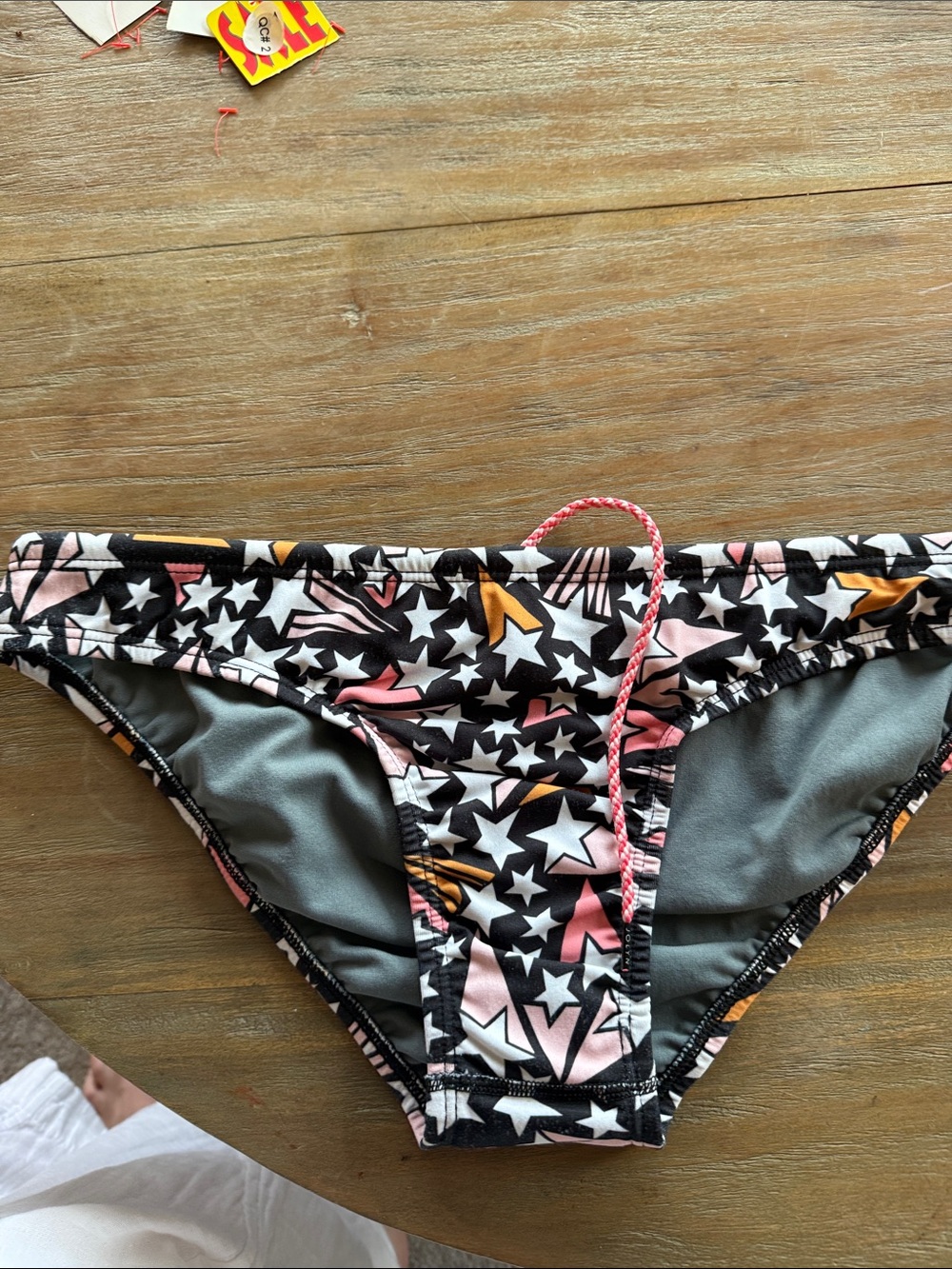 Jolyn Clothing Star-Print Bikini Bottoms in Black, Pink & Orange ANDY style